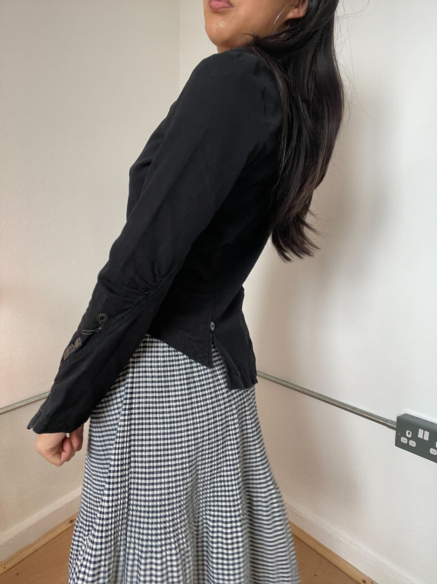 Black asymetrical button cop copine top