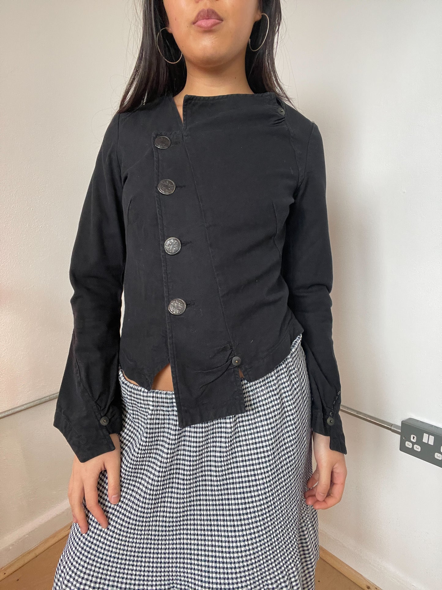 Black asymetrical button cop copine top