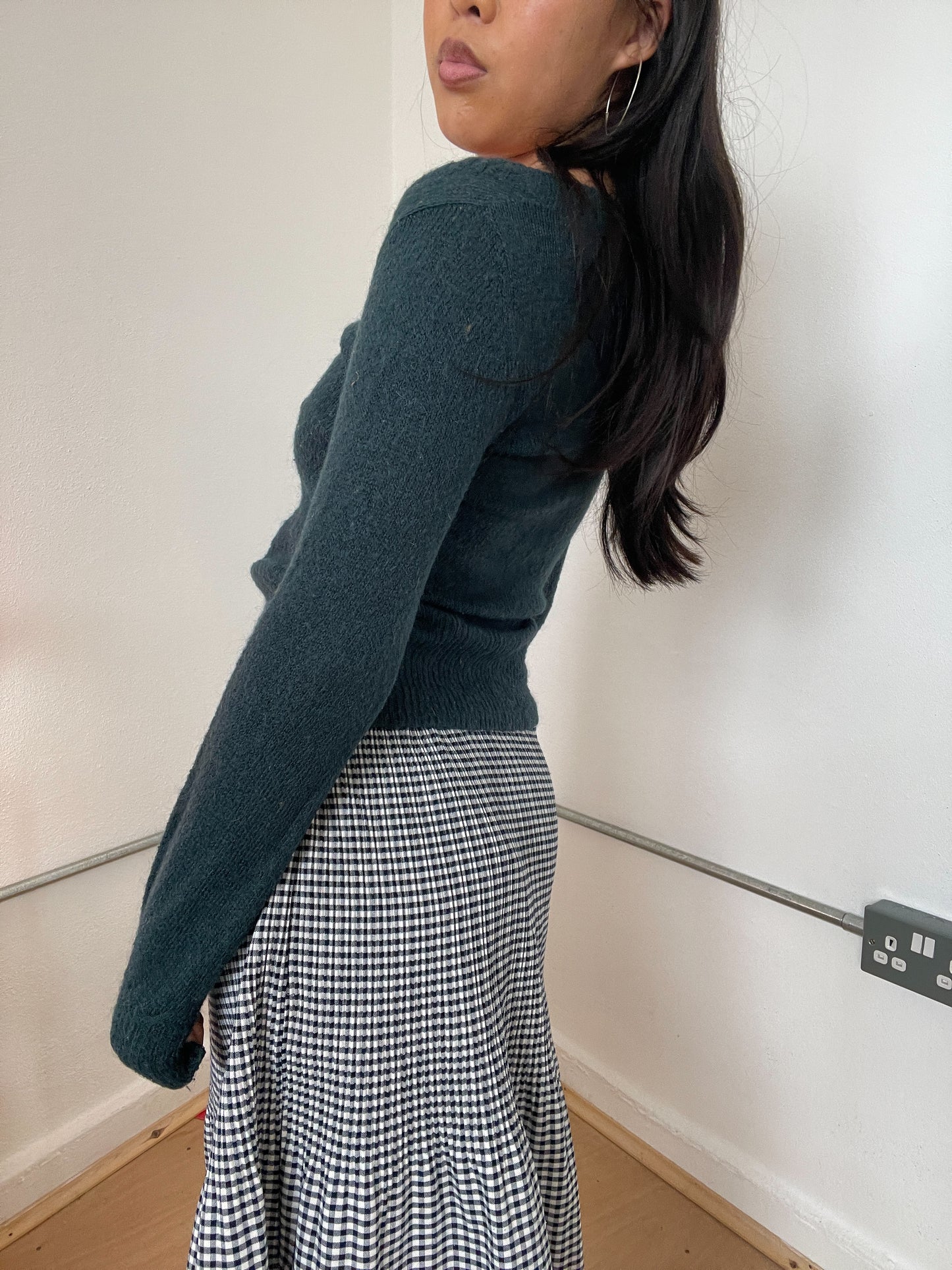 Dark green long sleeve knit top