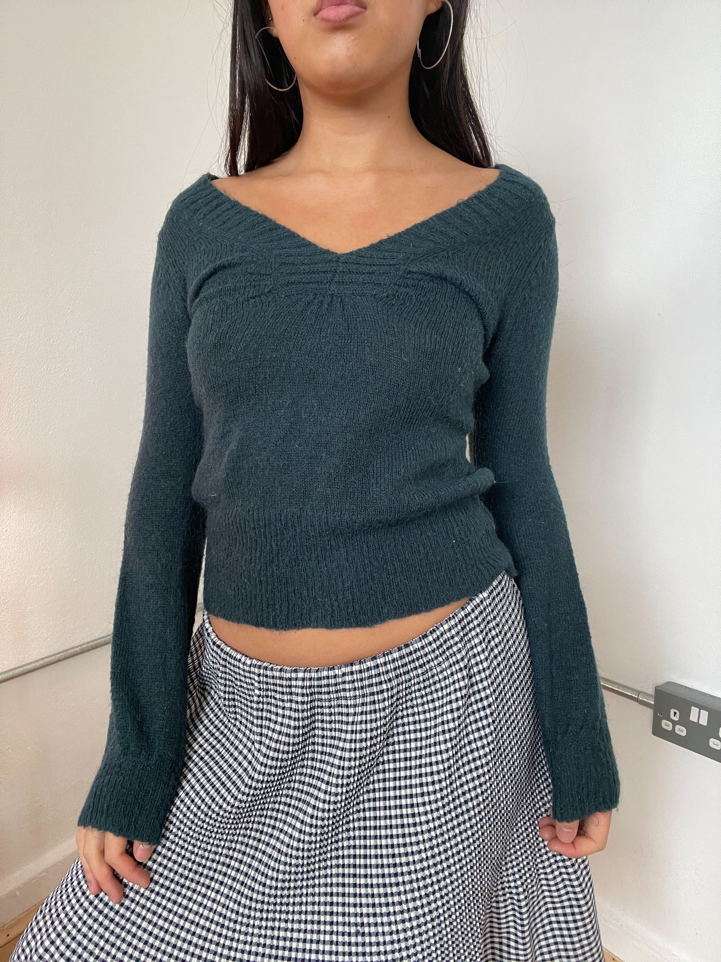 Dark green long sleeve knit top